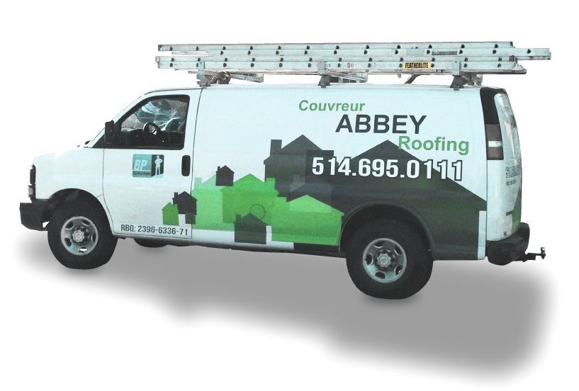 A white van with green and black lettering